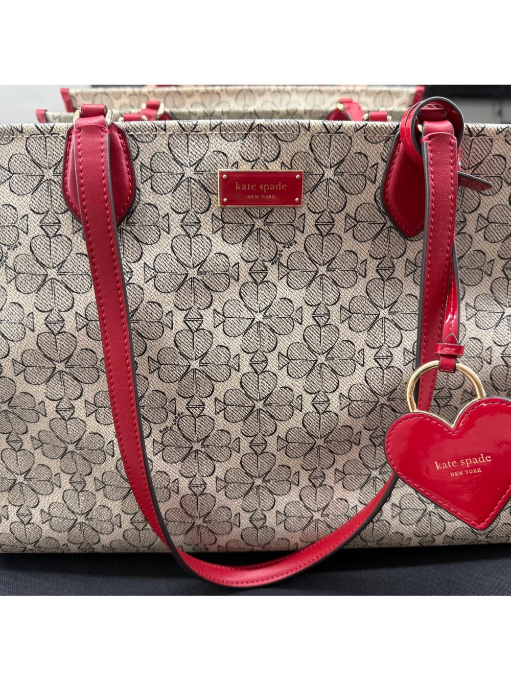 kate spade Beige Floral Tote with Red Trim and Heart Charm